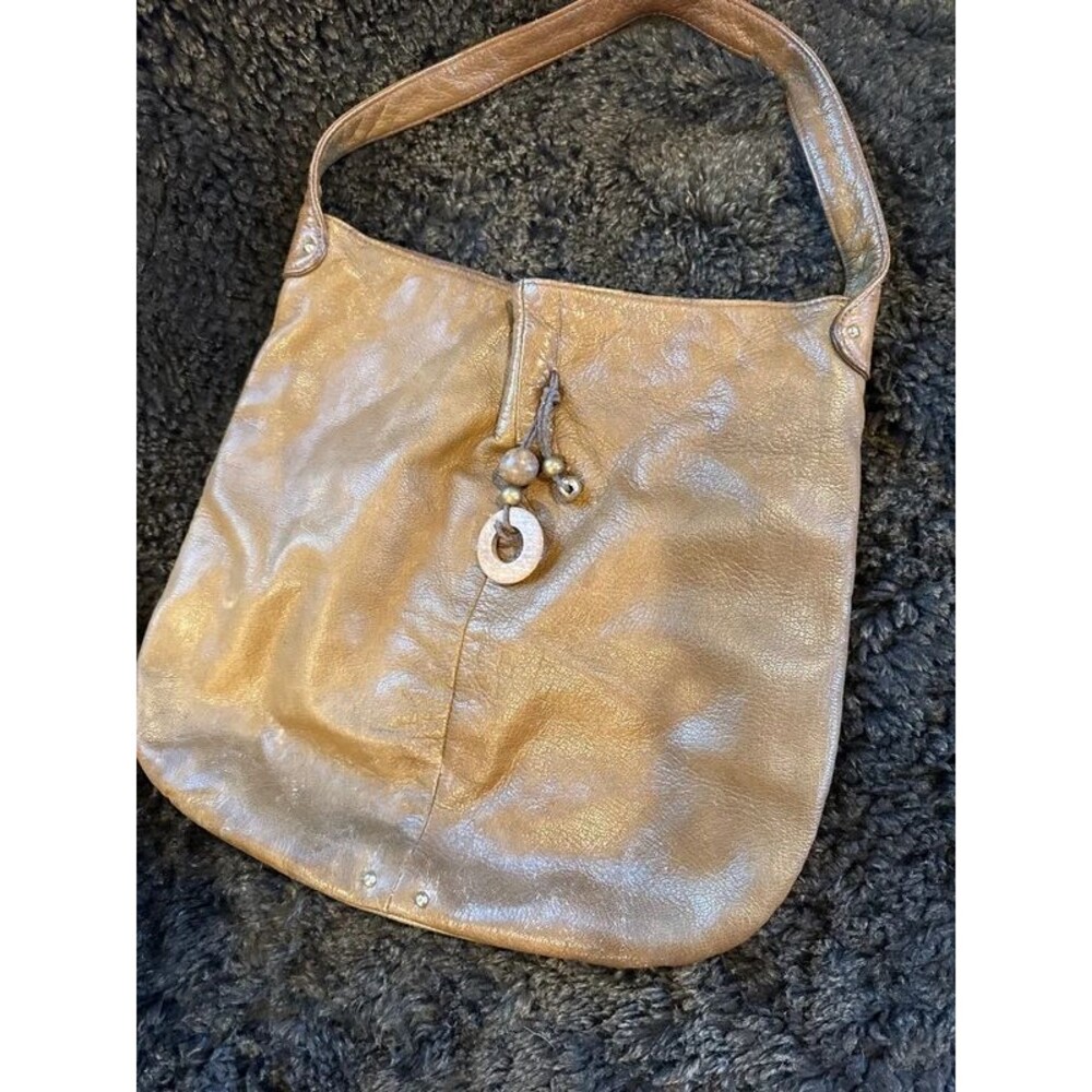 Lauren Merkin top colored bag hobo style
